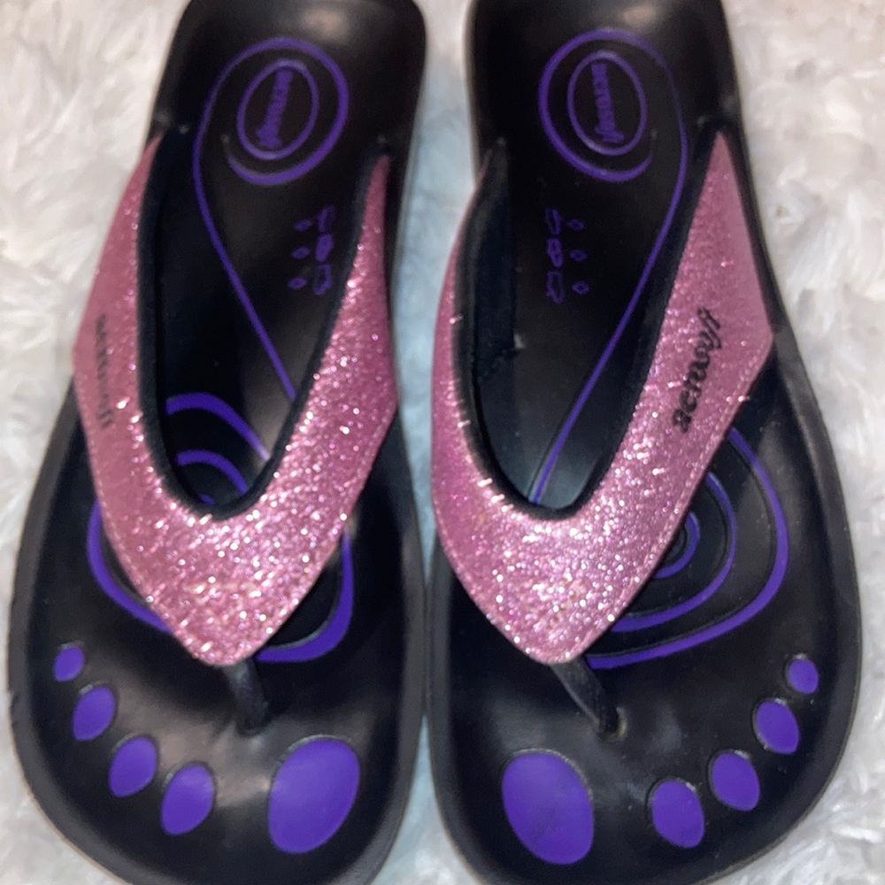 Pink sparkly flip flops